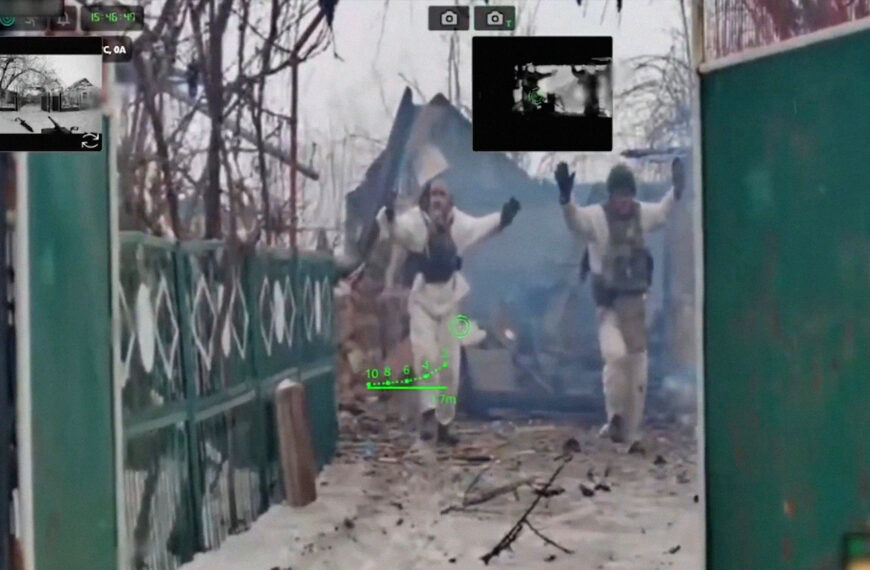 Russian Soldiers Seen Surrendering to Gun-Wielding Robot